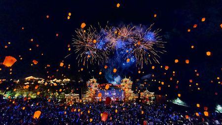 SHAORAO, CHINA - OCTOBER 08: Thousands of lanterns and fireworks light up the night sky over Gexian Village on October 8, 2025 in Shangrao, Jiangxi Province of China. These recyclable electronic lanterns, lifted by helium, create a dazzling display that is both eco-friendly and captivating. 