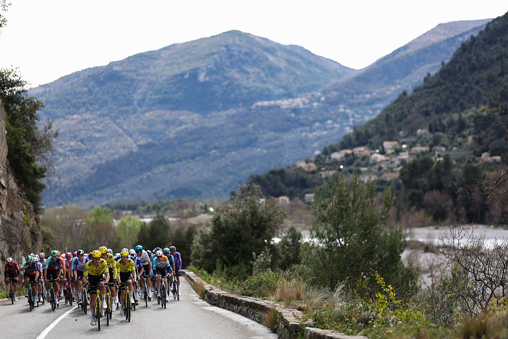 The pack rides during the 8th and final stage of the Paris-Nice cycling race, 129.2 km between Nice and Nice, on March 15, 2026. (Photo by Anne-Christine POUJOULAT / AFP)