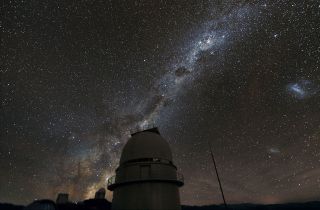 The Milky Way above the dome of the Danish 1.54-metre telescope at the European Southern Observatory's La Silla Observatory in Chile. This telescope was a major contributor to the PLANET project to search for exoplanets using microlensing.