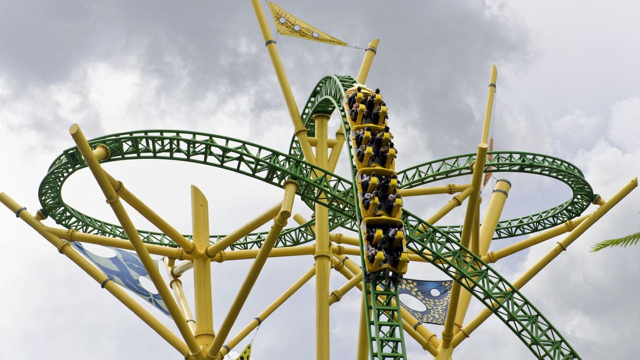 A roller coaster heads down a steep incline.