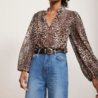 woman wearing leopard print shirt 