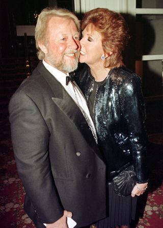 Cilla Black and her husband Bobby attending the Royal Television Society awards ceremony in 1997 (Neil Munns/PA Wire)