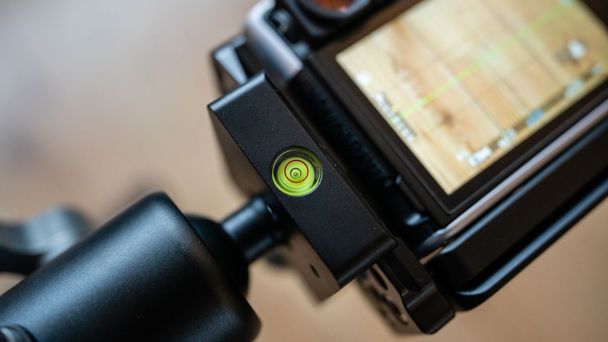 A camera photographing a flat lay scene