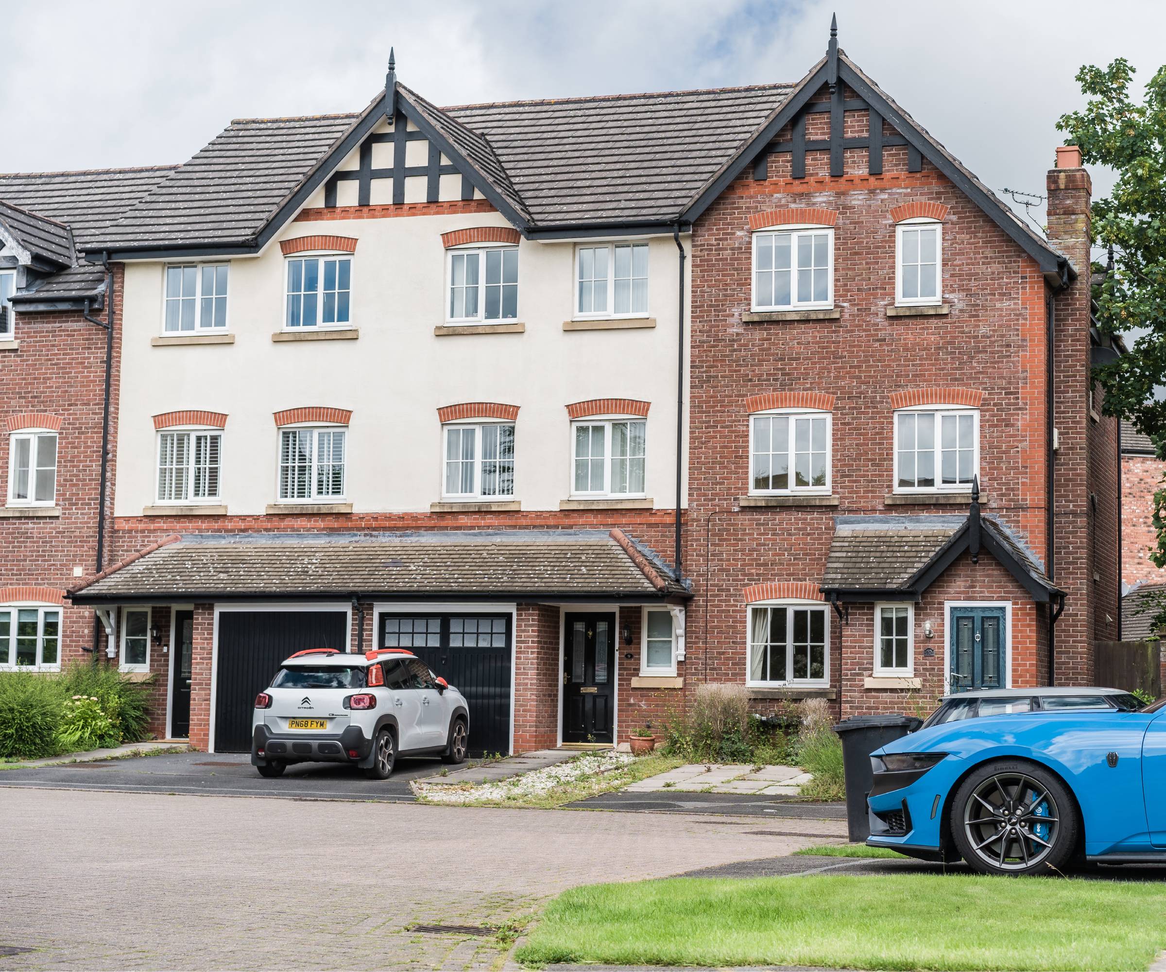 row of houses with shared driveways
