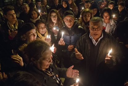 Tunisians protest the museum attack.