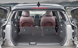 The Clubman might be large and handsome, but the chunky interior styling shrinks the perception of space (a glass roof thankfully keeps it from becoming too claustrophobic)