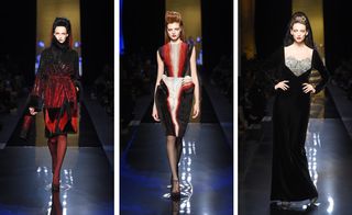 Three separate images of female catwalk models, wearing designer red and black theme dresses, dimly lit audience sat in seats watching, gloss black floor