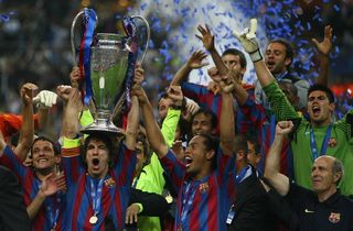 Barcelona players celebrate their Champions League final win over Arsenal in May 2006.