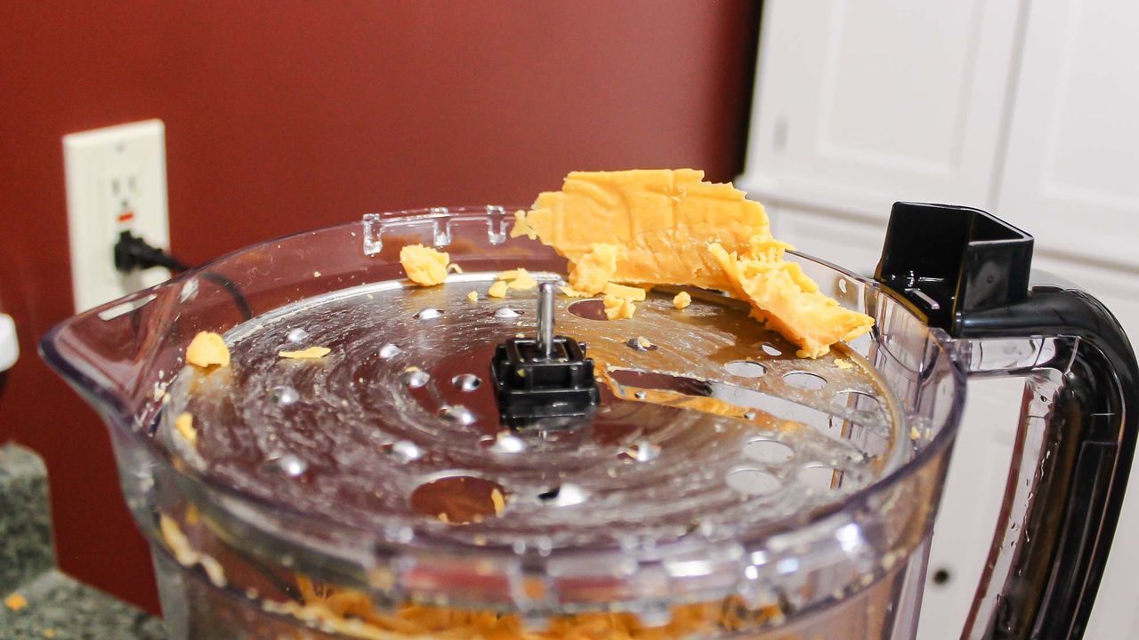 Hamilton Beach 12 Cup Stack and Snap Food Processor processing cheese