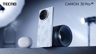 Tecno Camon 30 Pro 5G in silver leaning on a DSLR camera lens