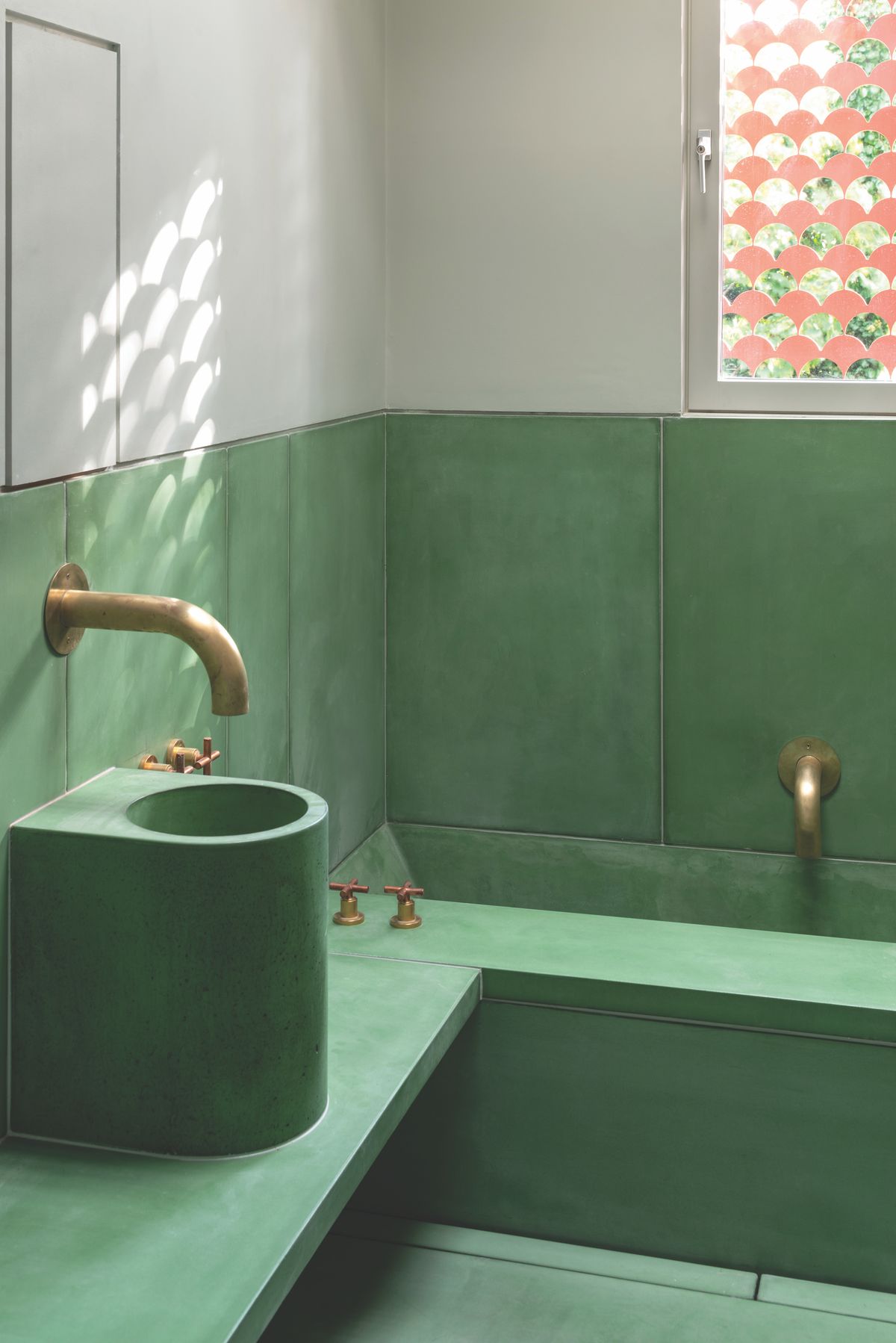 green concrete bathroom with circular sink