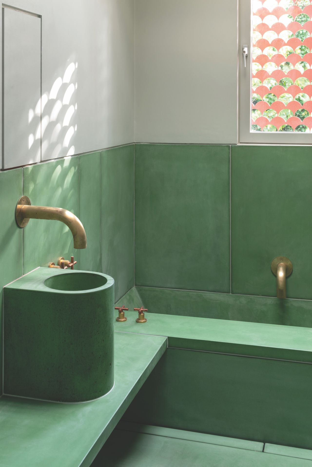 green concrete bathroom with circular sink