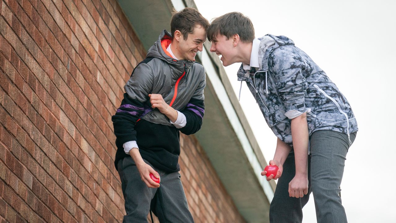 Dean Weaver (Francesco Piacentini-Smith) and Noel McManus (Liam Scholes) laughing together