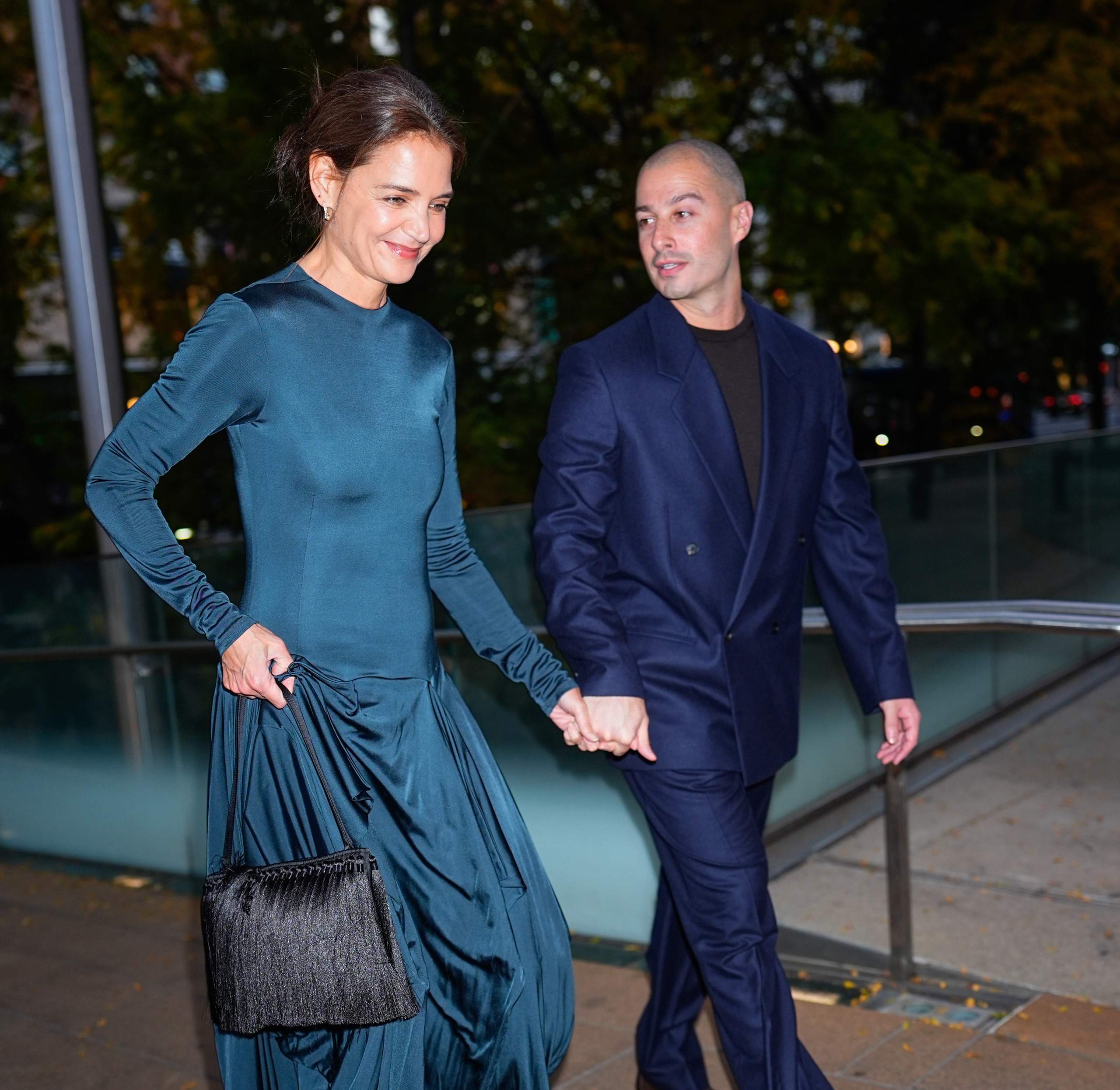 Katie Holmes arrived at the American Ballet Theatre Fall Gala in a long-sleeve satin dress and a fringe tassel-covered black evening bag