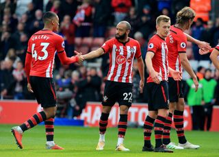 Southampton's Yan Valery (left) and Southampton's Nathan Redmond (22) after the final whistle during a Premier League match