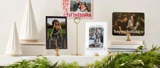 Holiday photo cards on mantle