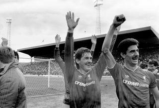 Kenny Dalglish and Ian Rush celebrate after winning the 1985/86 First Division title with Liverpool