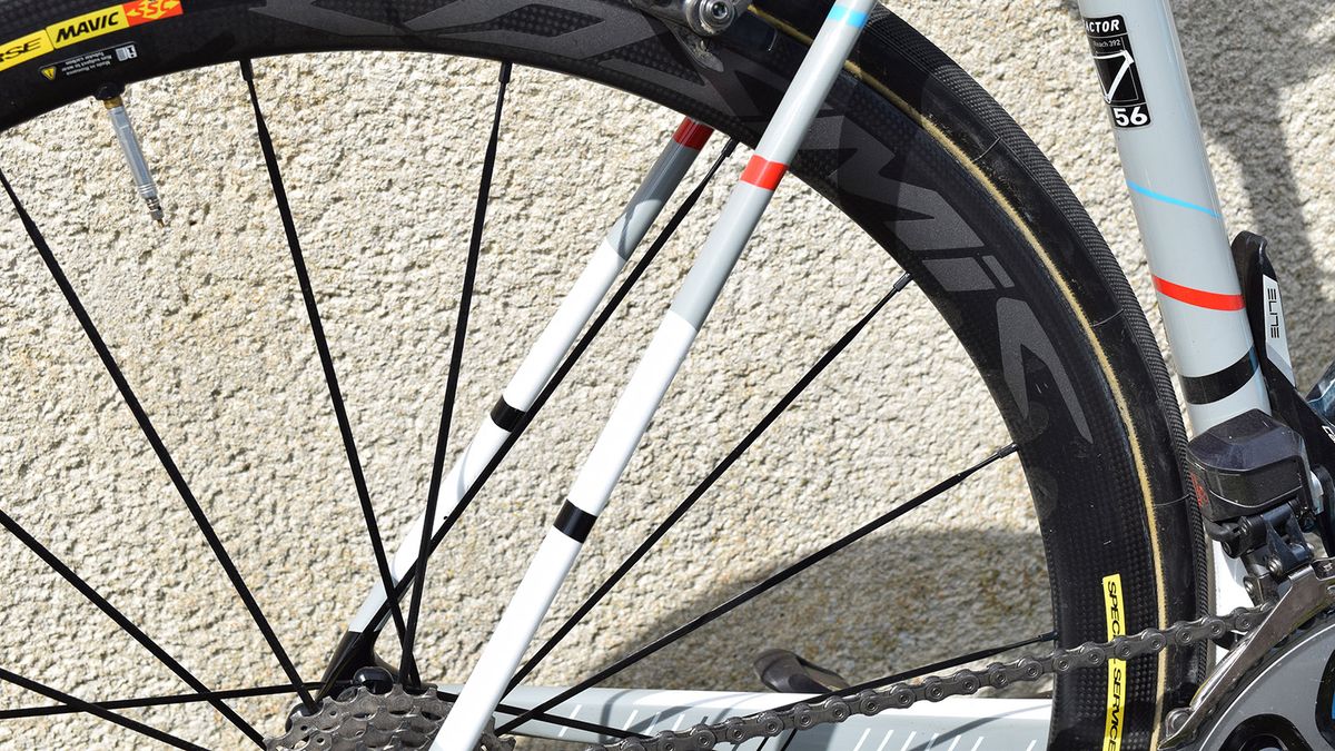 Flashes of red, white, black and blue feature on the frameset to represent the marking lines on the Roubaix velodrome