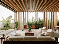 Sao Paulo apartment interior wrapped in warm timber and with great city views