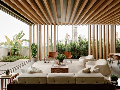 Sao Paulo apartment interior wrapped in warm timber and with great city views