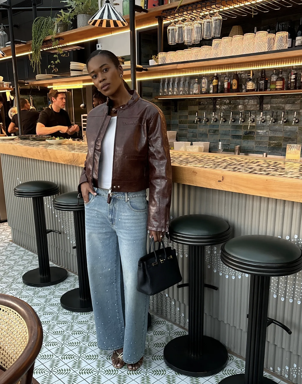 nlmarilyn wears sequin jeans leather jacket