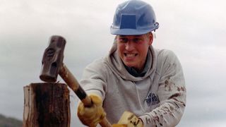 Prince William Hammering A Log In Chile