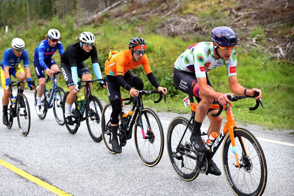 BRONNOYSUND NORWAY AUGUST 12 LR Iker Mintegi of Spain and Team Euskaltel Euskadi and Stephen Bassett of United States and Team Human Powered Health Polka Dot Mountain Jersey compete in the breakaway during the 9th Arctic Race Of Norway 2022 Stage 2 a 1543km stage from Mosjen to Brnnysund ArcticRace on August 12 2022 in Bronnoysund Norway Photo by Michael SteeleGetty Images