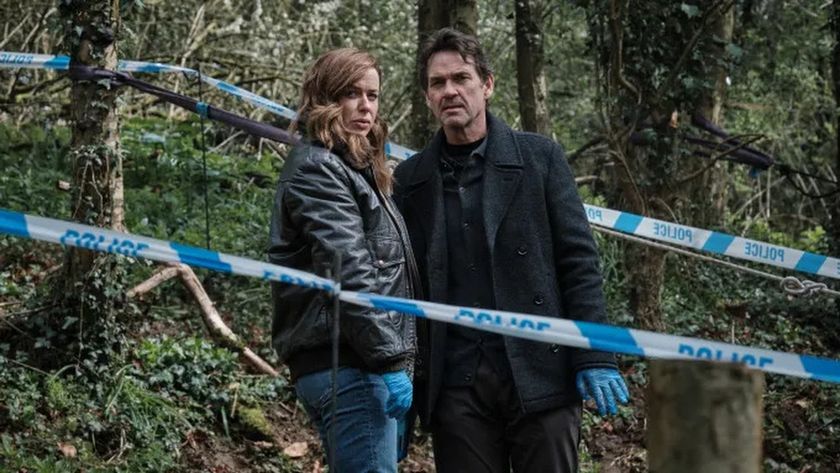 DCI Jeanette Kilburn (Eve Myles) and DI Lou Stanley (Dougray Scott) stand in a woodland crime scene in &quot;The Crow Girl&quot;