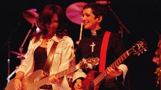 The Go Go's Kathy Valentine and Jane Wiedlin [right] onstage at the Greek