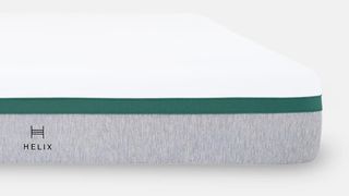 Best Helix mattress sales, discounts and deals: the Helix Twilight mattress shown with light gray base, white top and a green band around the middle