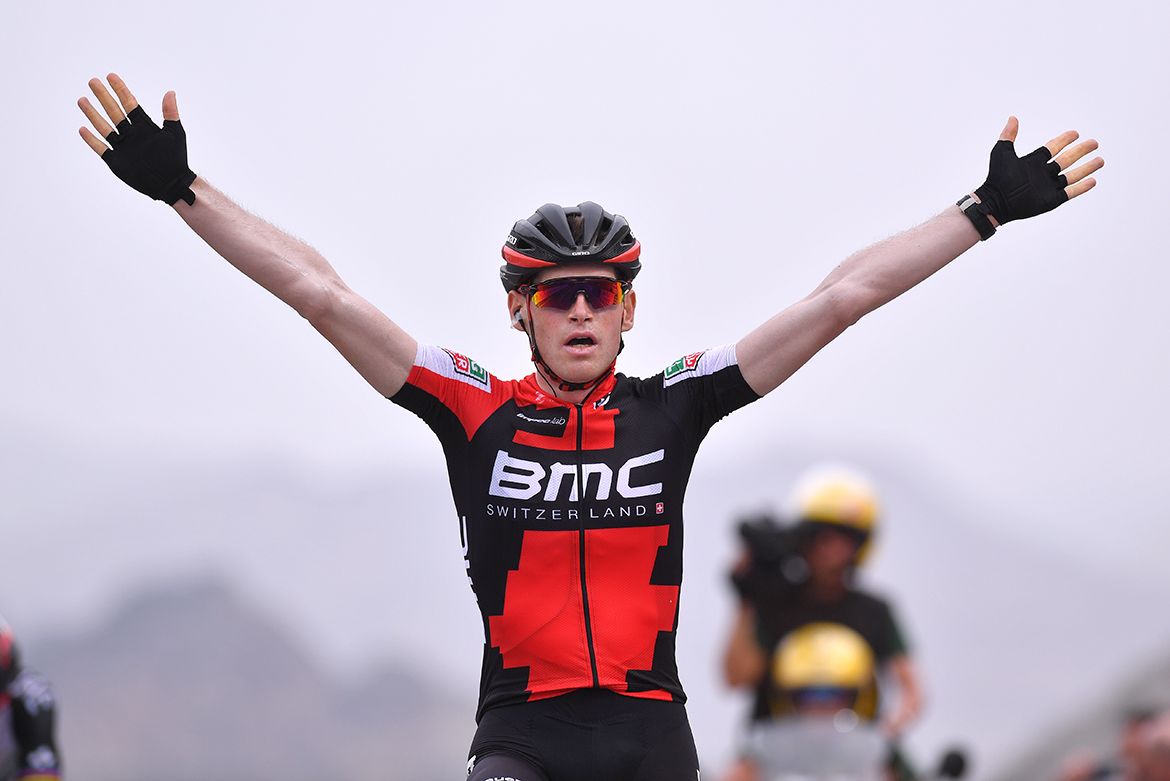 Ben Hermans raises his arms in celebration
