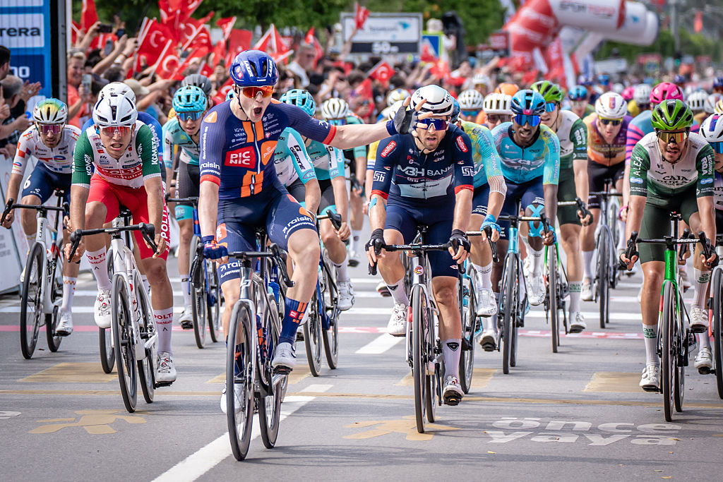Van Uden pictured at the front of the peloton after winning the sprint