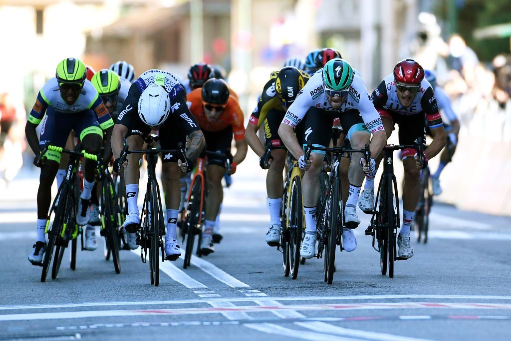 BORGOSESIA ITALY OCTOBER 07 LR Giacomo Nizzolo of Italy and Team Qhubeka Nexthash Olav Kooij of Netherlands and Team Jumbo Visma Matthew Walls of United Kingdom and Team Bora Hansgrohe and Matteo Trentin of Italy and UAE Team Emirates sprint at finish line during the 105th Gran Piemonte 2021 a 168km race from Rocca Canavese to Borgosesia 350m GranPiemonte on October 07 2021 in Borgosesia Italy Photo by Tim de WaeleGetty Images
