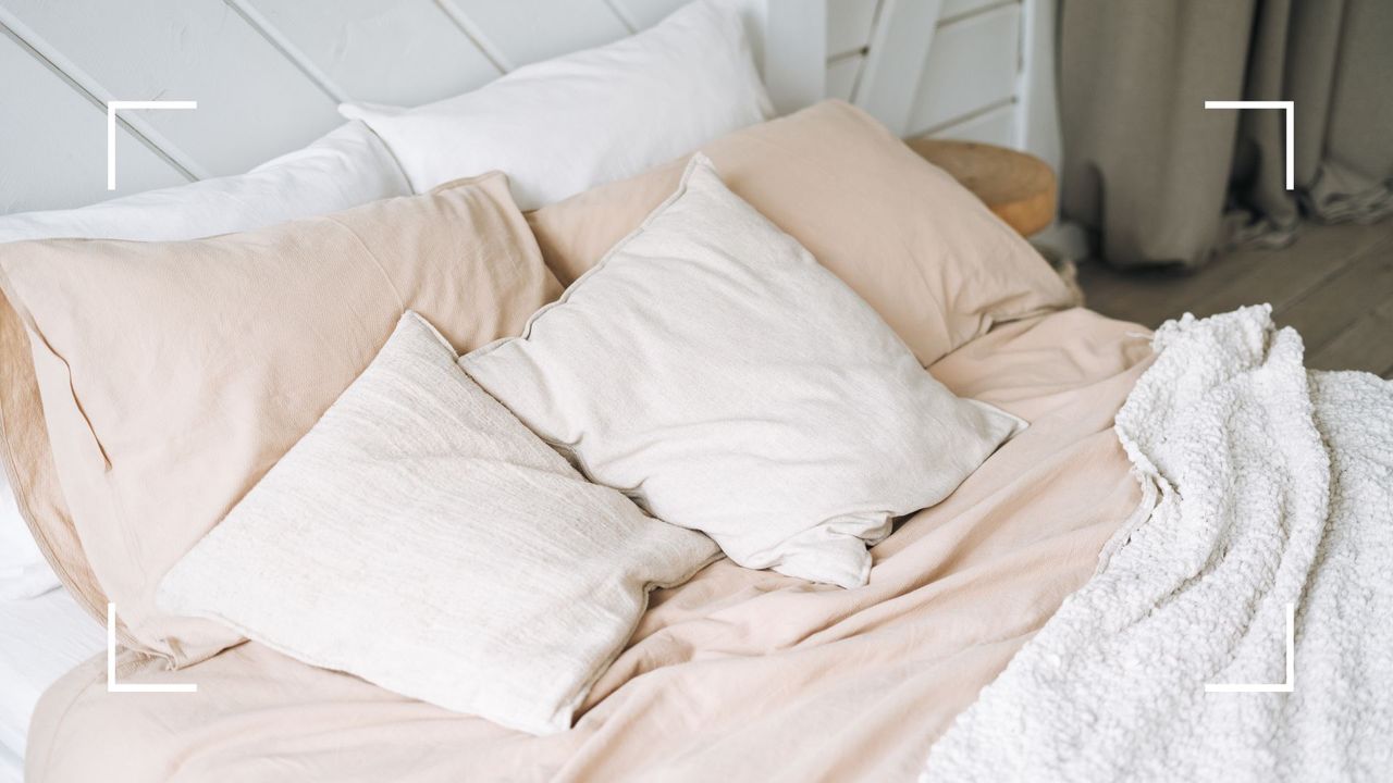  picture of bed with beige bedding 