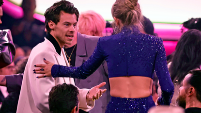 Harry Styles and Taylor Swift speak during the 65th GRAMMY Awards at Crypto.com Arena on February 05, 2023 in Los Angeles, California.