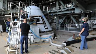 Engineers Work To Diagnose A Valve Malfunction On The Boeing Starliner In August 2021