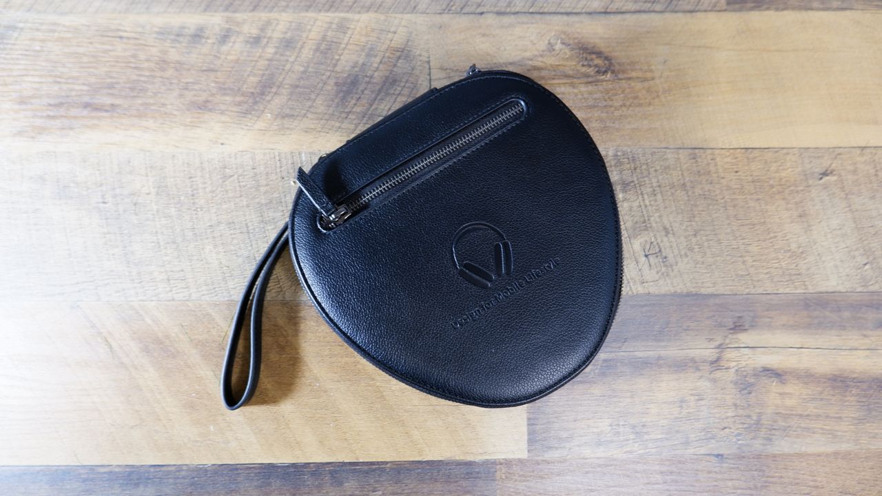 WIWU Leather Headphone Case for AirPods Max closed on a wooden floor