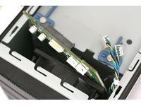 A gentle lift is usually enough to separate backplane and motherboard
