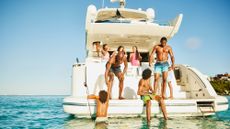 Group of people on a yacht in the Caribbean Sea during a vacation