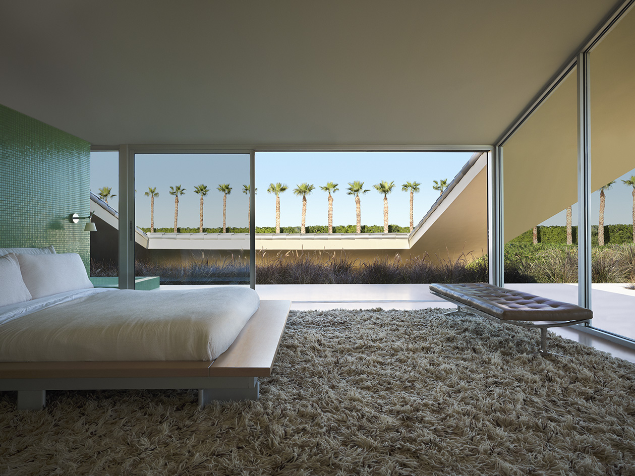 Desert house by Robert Stone, a home made with perforated partitions and an intense pitched low roof