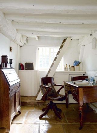 Office with bureau and ladder