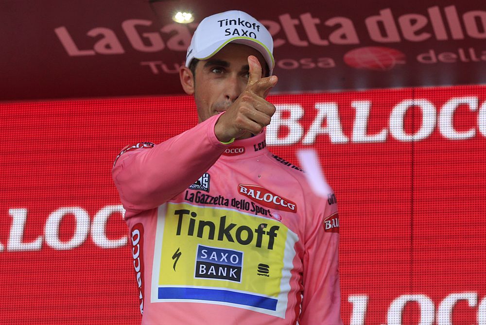 Alberto Contador (Tinkoff-Saxo) in the maglia rosa, doing his pistolero salute