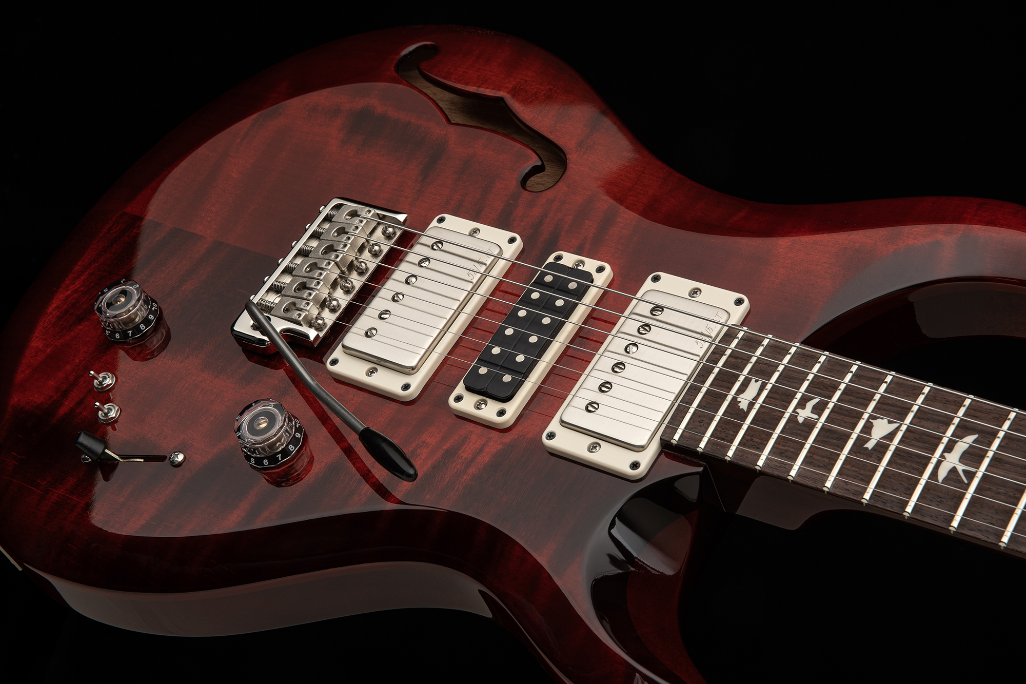 A photo of the PRS S2 Special Semi-Hollow in Fire Red Burst finish