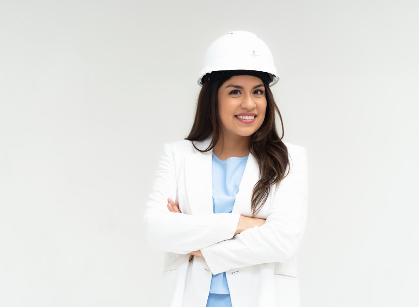 A picture of Elizabeth Vergara in a construction hat and suit