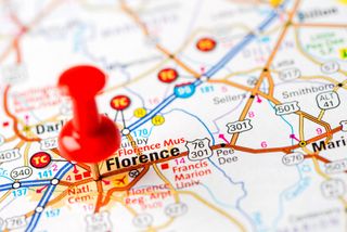 A street map with a red pin over Florence, South Carolina.
