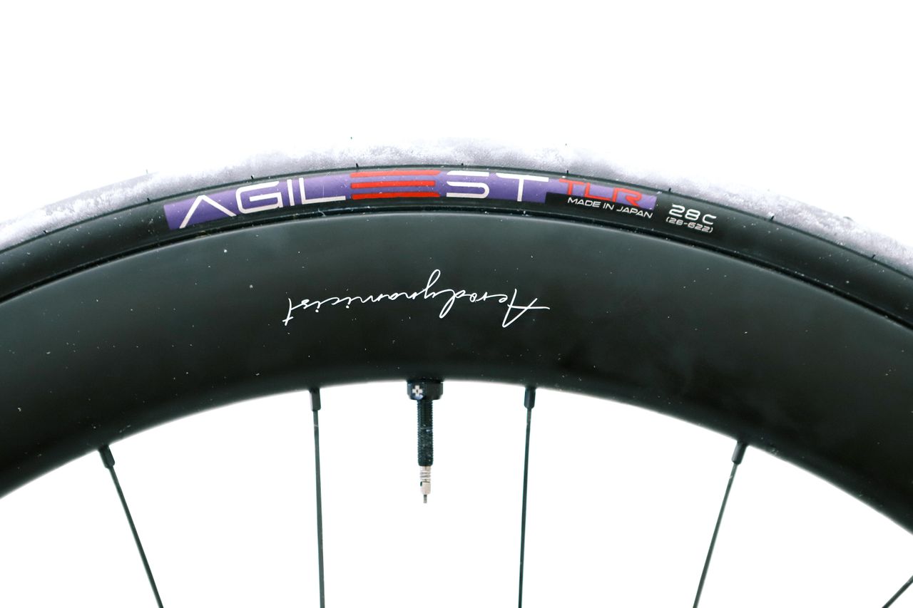 a close up of a black road bike tyre
