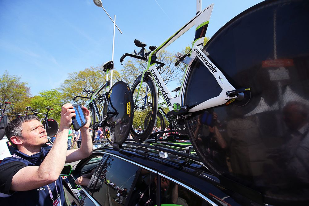 The UCI uses its special tablet to check bikes for mechanical doping during the Giro's opening stage.
