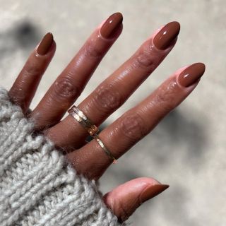 @themaniclub deep brown nails