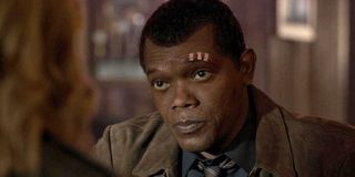 Samuel L. Jackson as de-aged Nick Fury talking to Carol Danvers in a diner in Captain Marvel