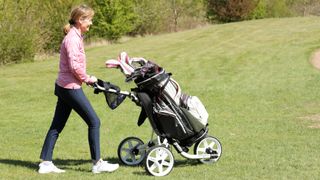woman pushing ClicGear 4.0 3-Wheel Push Golf cart